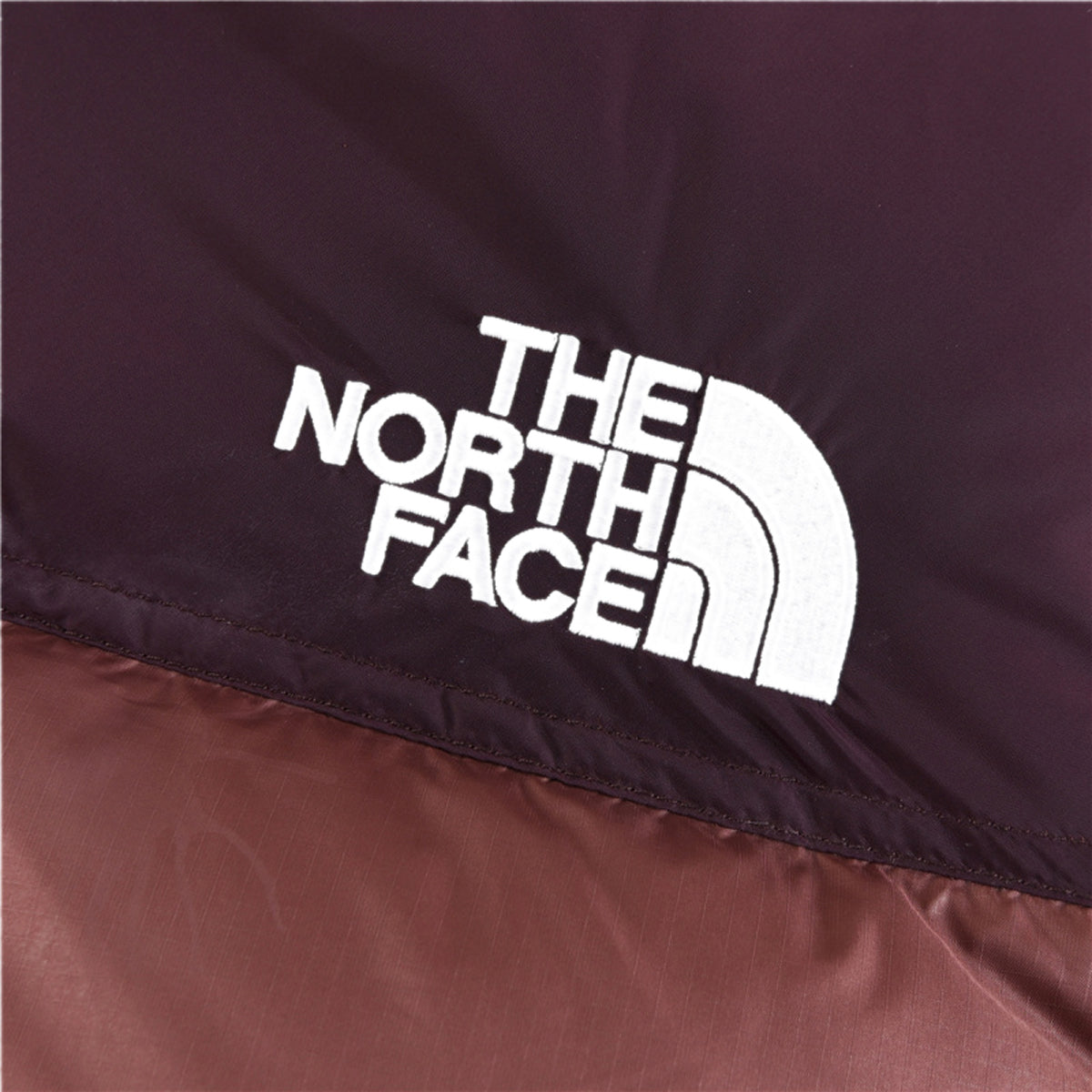 The North Face Brown Puffer Jacket for Outdoor Days
