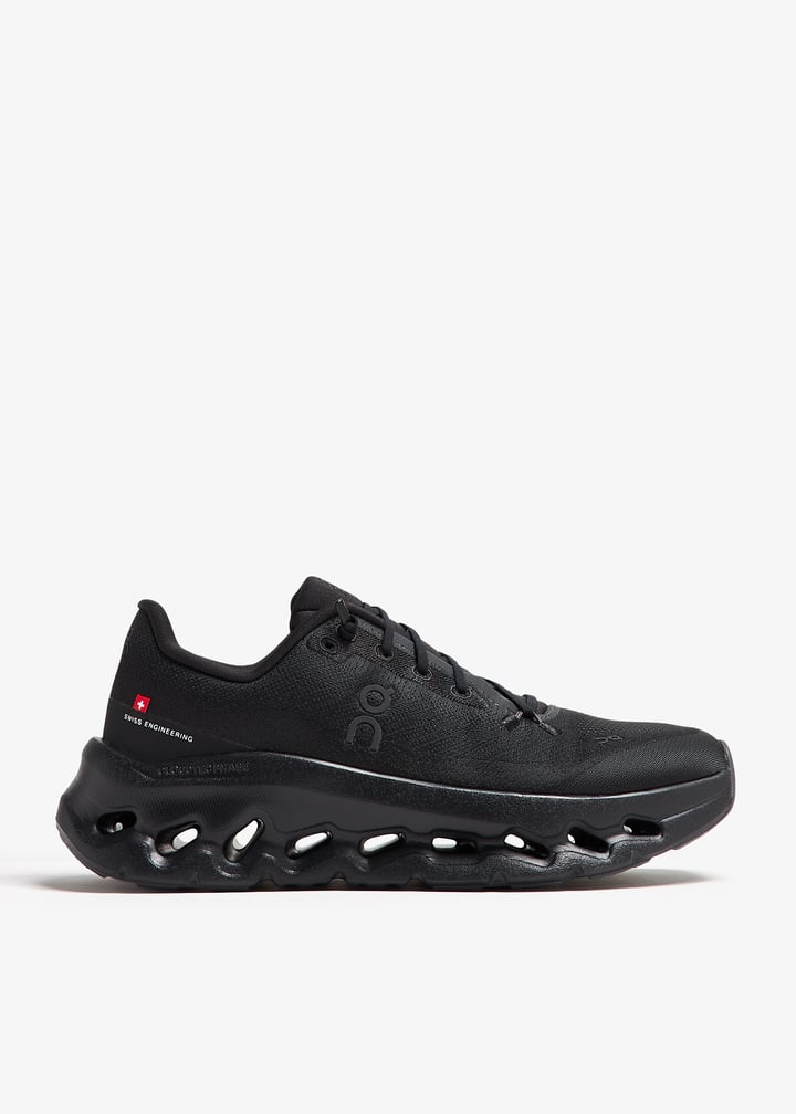 On All-Black Sneakers with Sculpted Cutout Sole