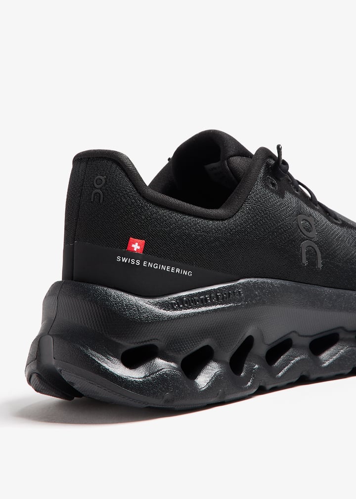 On All-Black Sneakers with Sculpted Cutout Sole