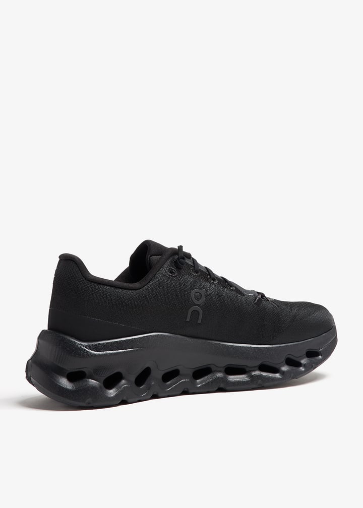 On All-Black Sneakers with Sculpted Cutout Sole