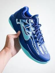 Nike Navy Low-Top Sneakers with Light Blue & Teal Accents